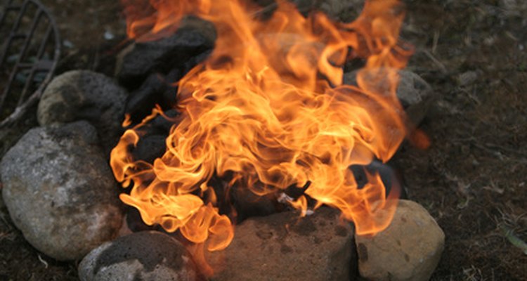 Backyard fire pits must be surrounded by a noncombustible material such as rock.