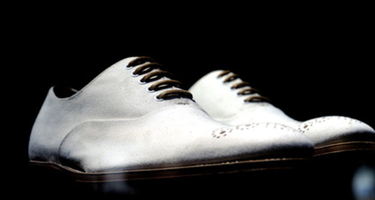 You can remove black marks from white leather shoes using common household products.
