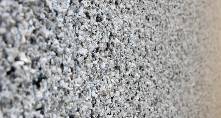 Scrape loose particles off the roughcast before priming.