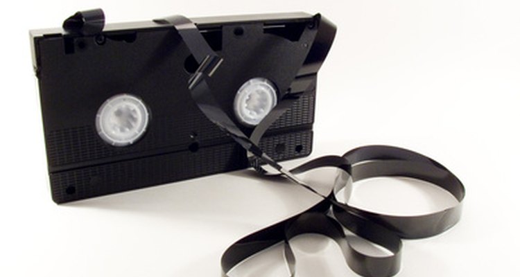 VHS cassette with exposed, snarled videotape.