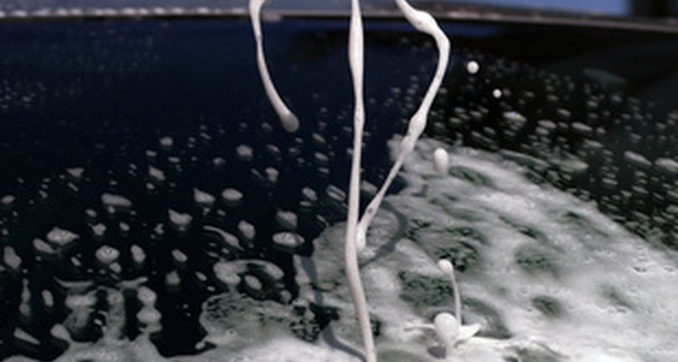 Washing your car helps remove hydraulic fluid from the surface.