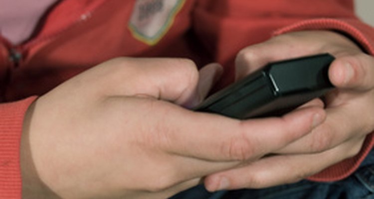 Use an SMS gateway to e-mail text messages to your recipient/contact.