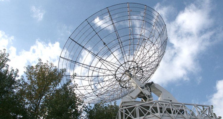 The parabolic shape of a satellite dish is similar to that used in some parabolic roofs.