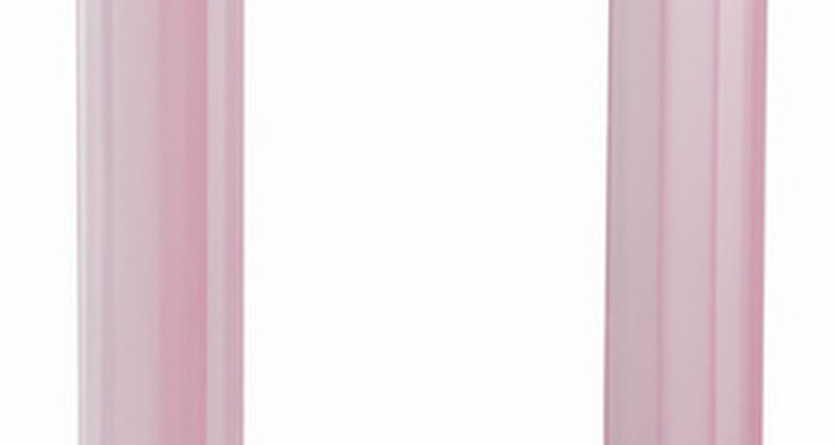 Paint inexpensive plastic frames to match any decor.