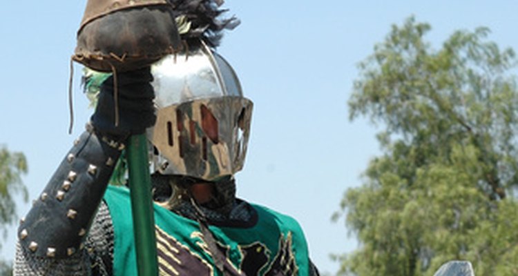 Your papier-mâché knight helmet will become hard once it dries.