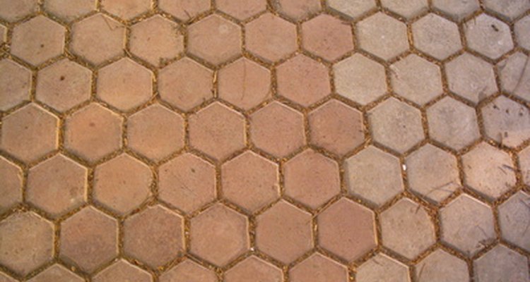 Remove hexagonal quarry tiles as you would any quarry tile.