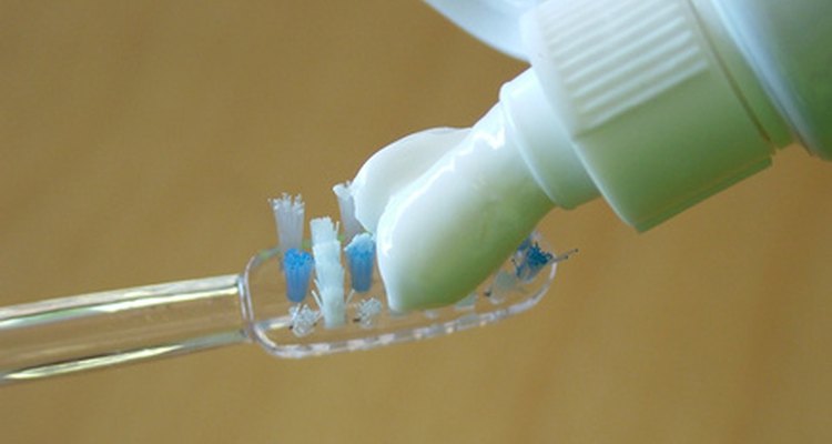 White toothpaste safely cleanses stained leather.