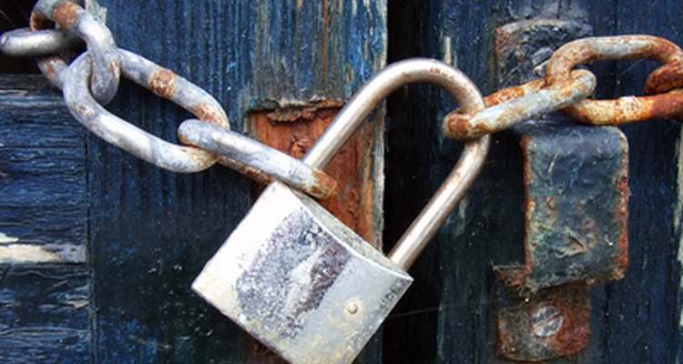 The U-shaped metal bar is called the hasp or shackle.