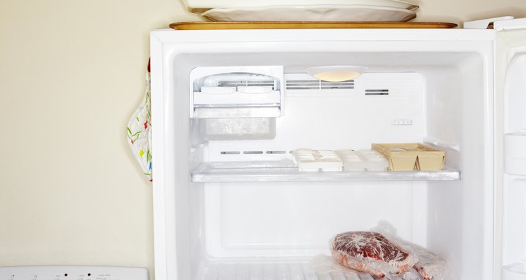 Remove food from the freezer before you remove rust stains.