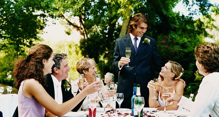 Groom Proposing a toast at a Wedding Reception Held in a Garden