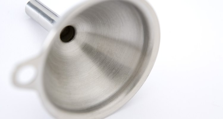 A funnel shape is often depicted for a tin man's hat.