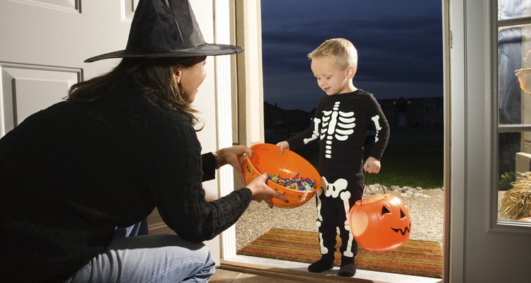 Boy trick or treating on Halloween