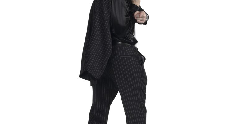 Classic gangster look including black fedora with white band