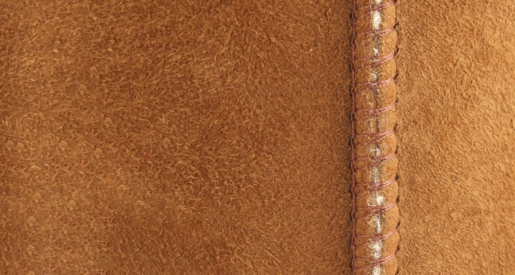 Brown suede background with seam