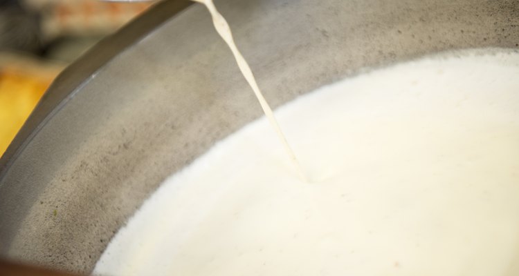 Milk Pouring into large commercial pot