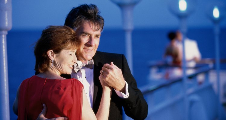 Close-up of a mature couple dancing on the deck of a cruise ship