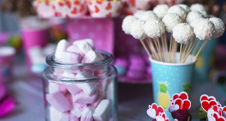 Marshmallow, sweet colored meringues, popcorn, custard cakes and cake pops