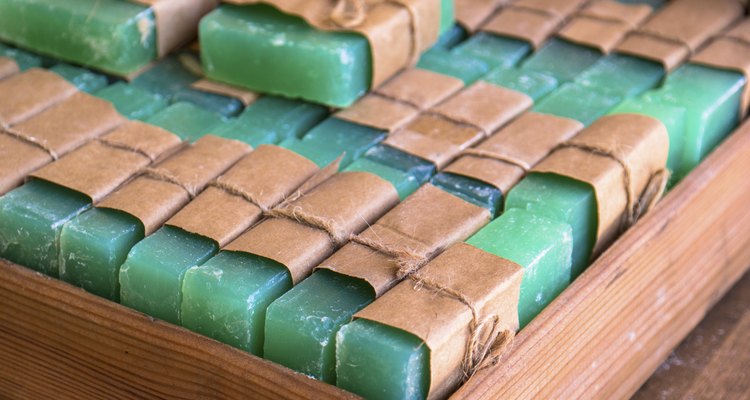 Green soap bars in a wooden box