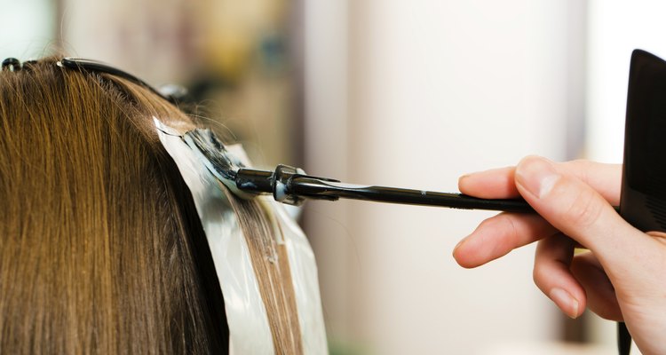 At the hairdresser ? woman gets new hair colour