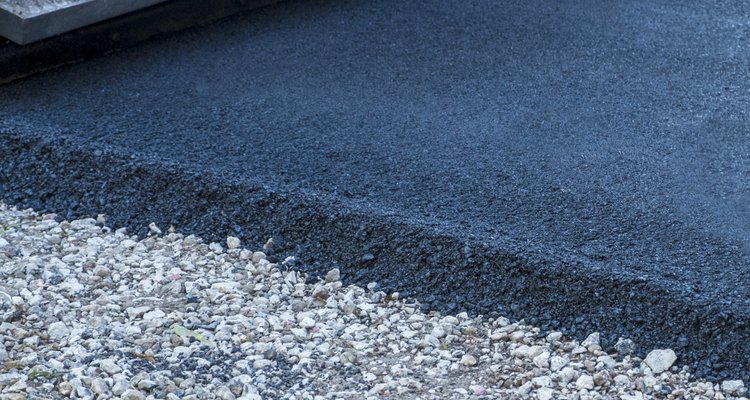 Asphalt is easier to drill than concrete.