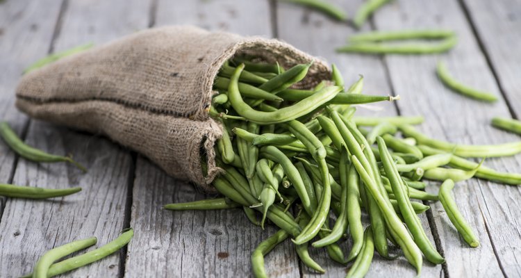 Some Green Beans on wood