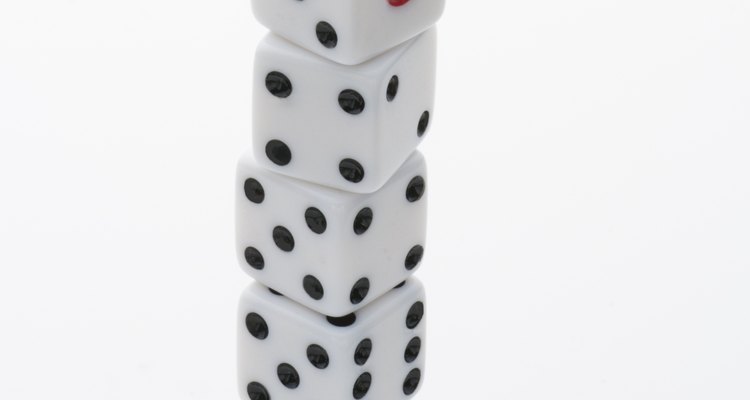 Challenge Yahtzee uses dice like these to play a Poker-like game.