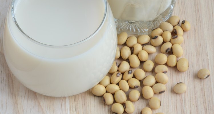 Fresh Soy milk in a glass and soybean seeds