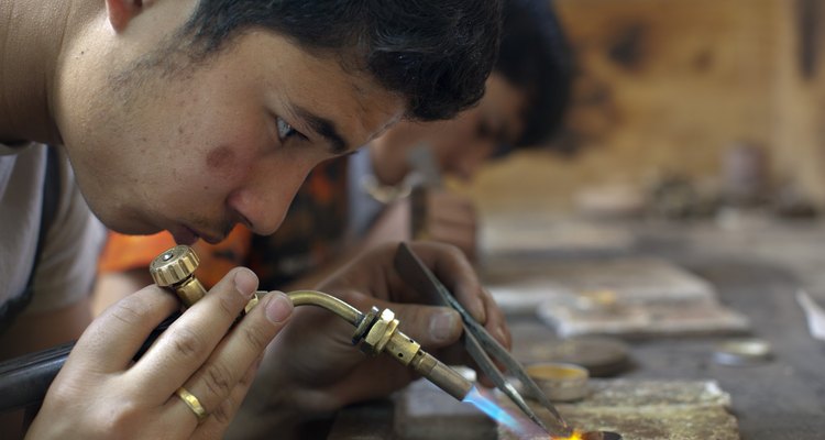 Copper-coloured solder connects copper jewellery joints.