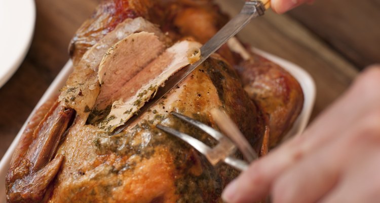 Carving a tasty Thanksgiving roast turkey