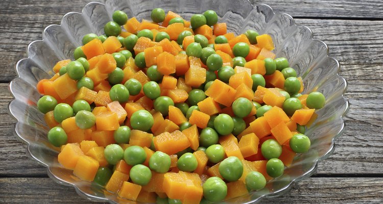 Boiled carrots with green peas