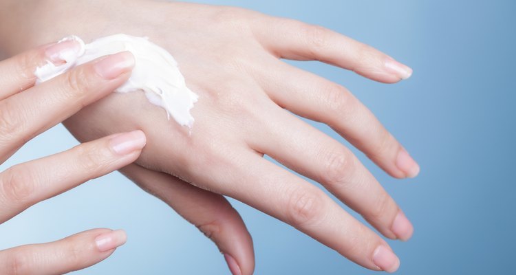 Skin care. Female palms with moisturizing cream.