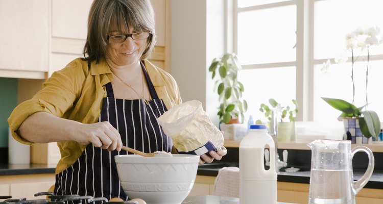 Woman cooking in kitchen