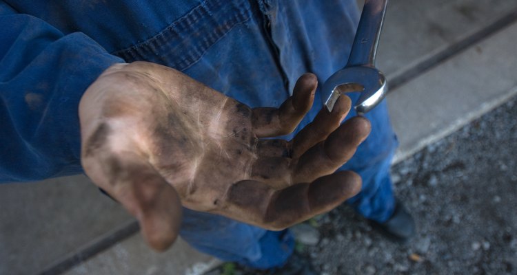 Hand tools and a willingness to get dirty are necessary to install a drop kit.