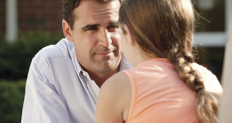 Father and daughter talking together