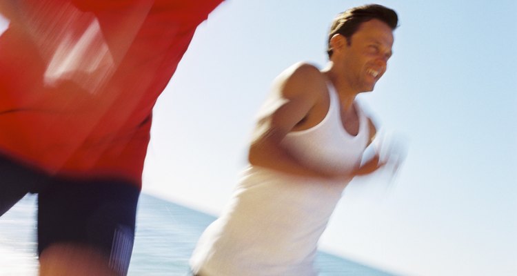 Men running on the beach