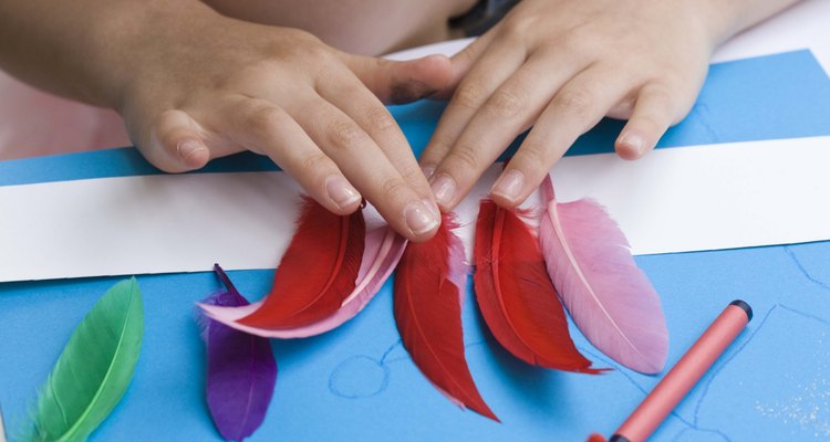 Use colourful feathers to make a Yanomami headdress.