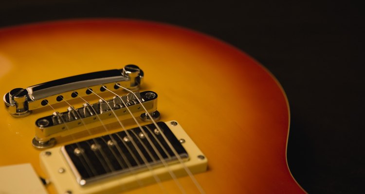 Grounding a guitar's electronics to the bridge provides a good way to mitigate electrical interference and ground loops.
