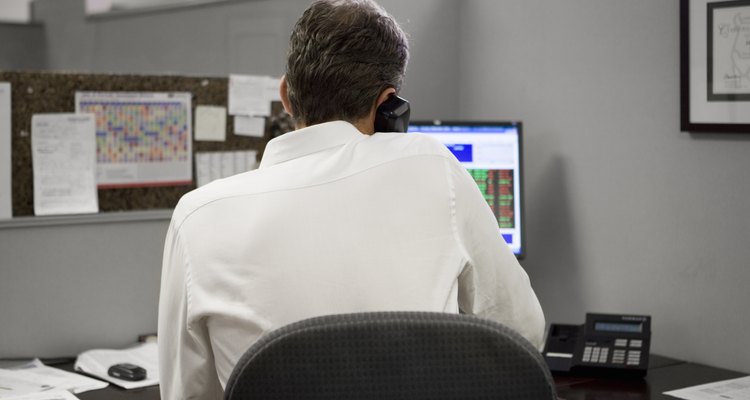 man in office on the telephone