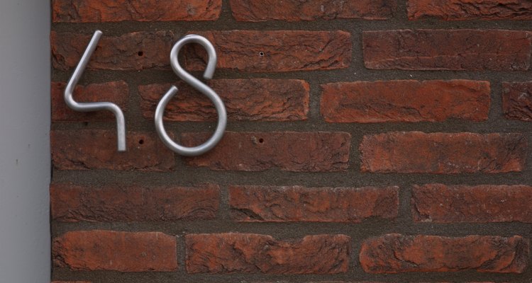Install house numbers on brick without masonry anchors using Gorilla Glue.