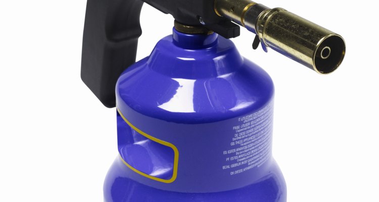 A regular propane blowtorch burns hot enough to melt down scrap aluminium.