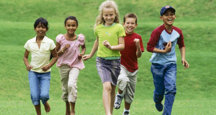 Portrait of a group of children running