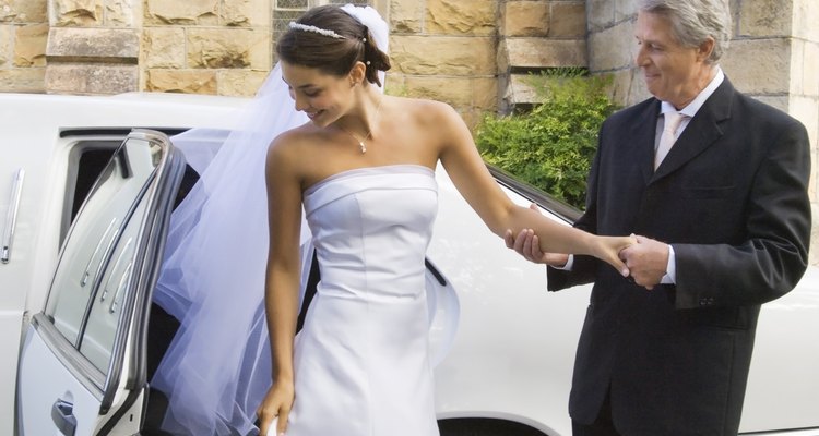 Car doors are most often the source of grease stains on satin wedding dresses.
