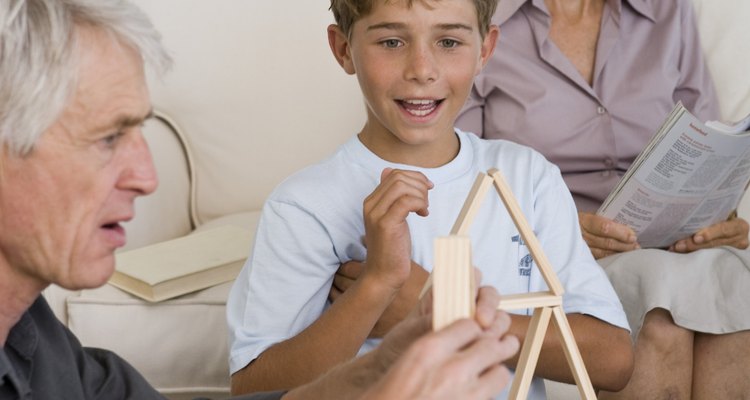 Grandfather and grandson playing game