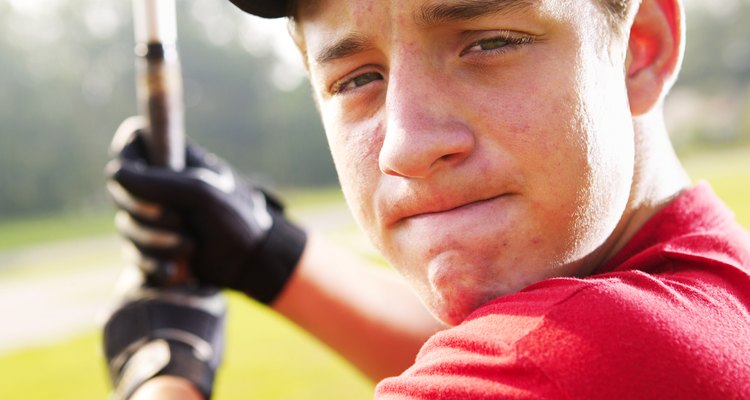 Close-up of a baseball player's face as he concentrates preparing to hit the ball