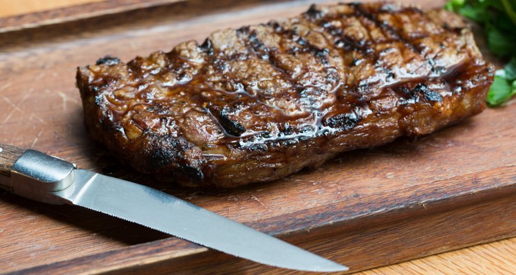 Grilled Steak on Wooden Board
