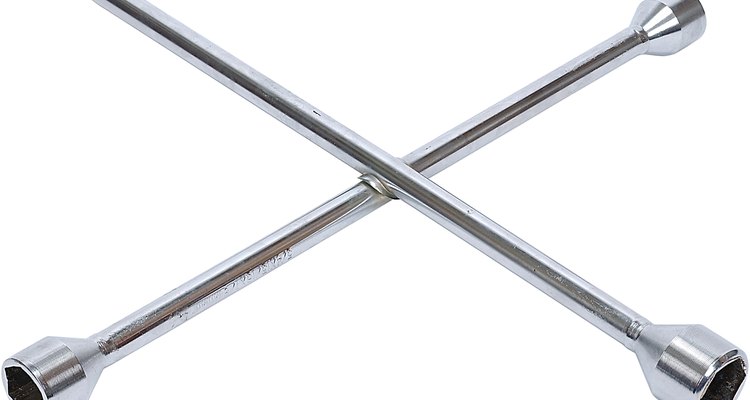 Use your lug wrench to tighten the lug nuts after you've put Loctite on them.