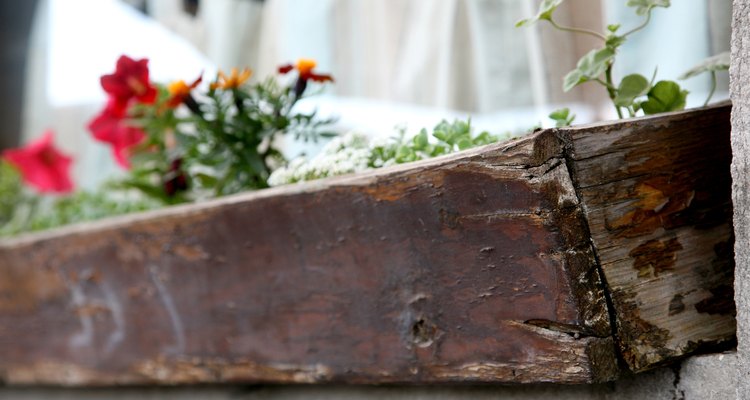 Waterproofing a wooden planter extends its life.