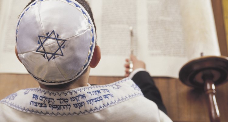 Boy reading the torah at his Bar Mitzvah