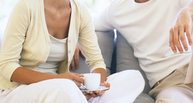 Couple on couch talking