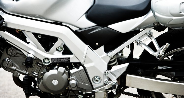 The dipstick is located on the engine for accurate readings.
